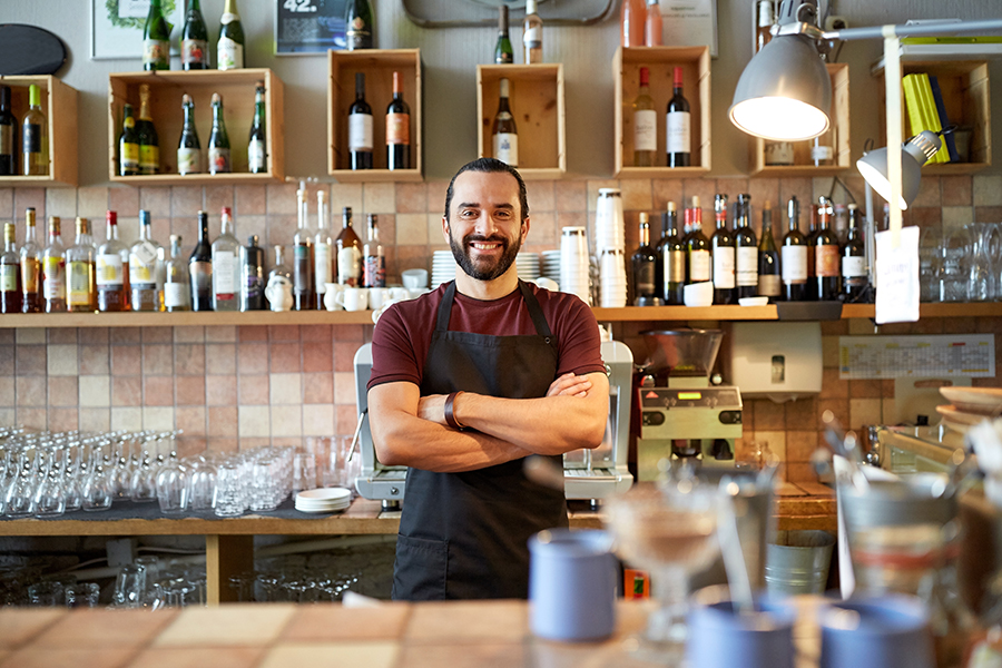 restaurant point of sale restaurant manager standing at restaurant point of sale