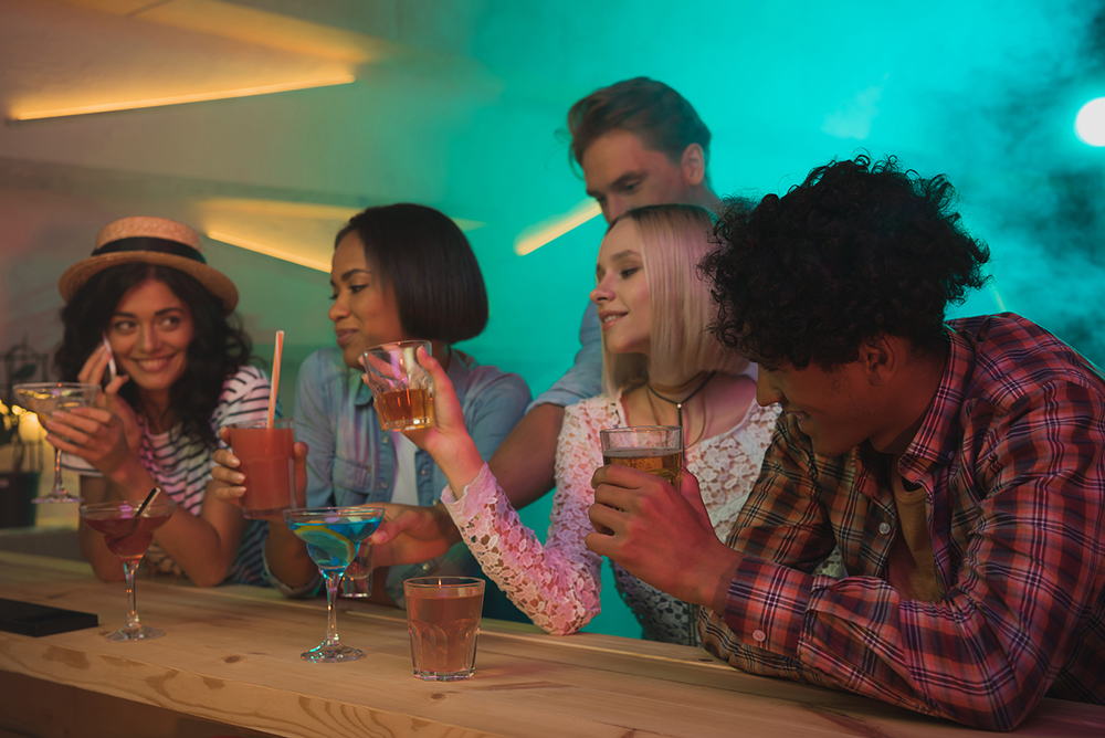 bigstock-Multiethnic-Friends-Drinking-C-203864704