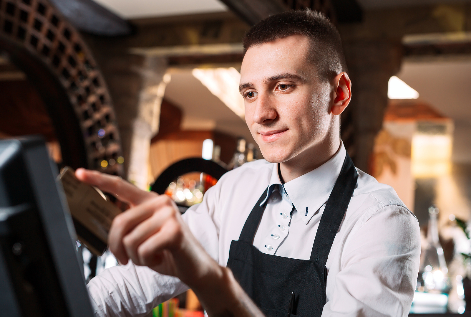 waiter using restuarant point of sale system